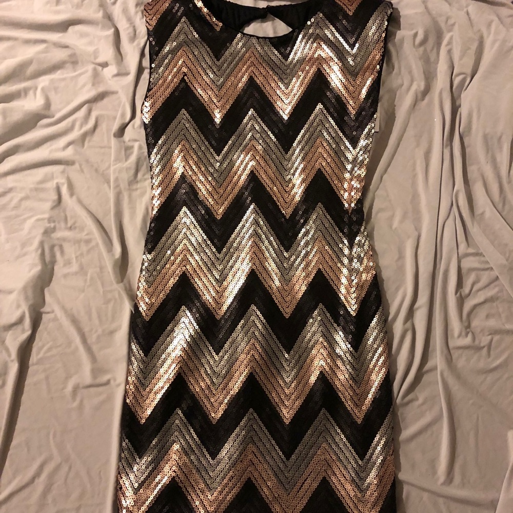 Body con, sequin dress.